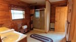 En suite full bathroom with standing shower
